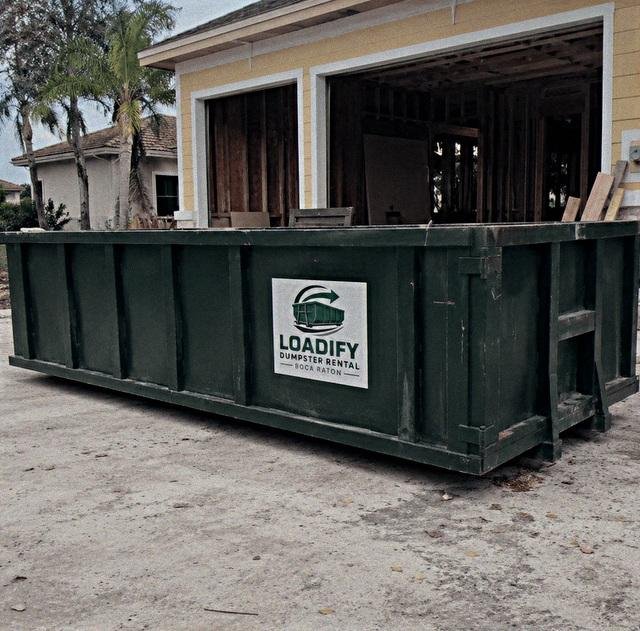 Loadify roll-off dumpster at a Boca Raton construction site